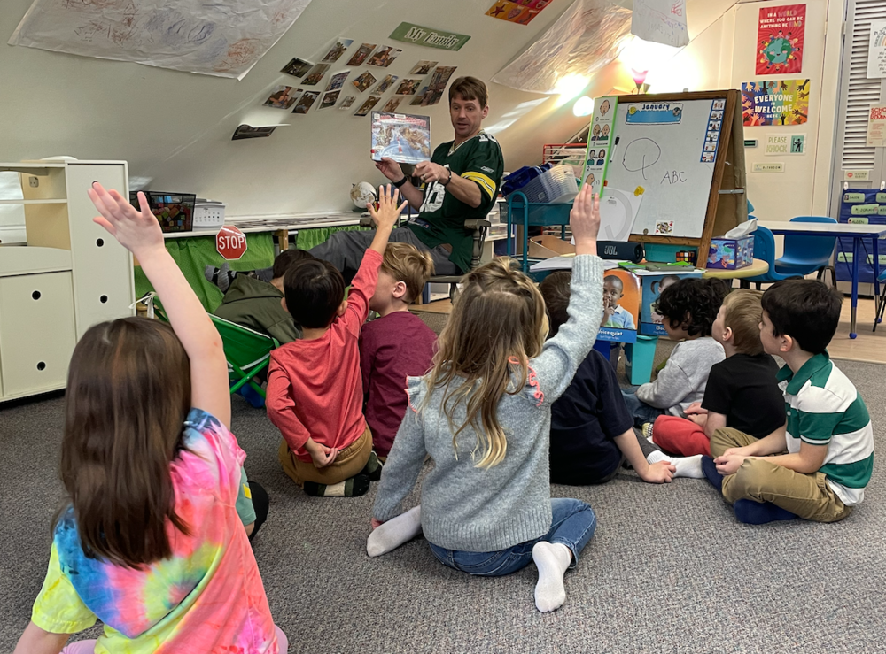 Teacher reading to 4K students