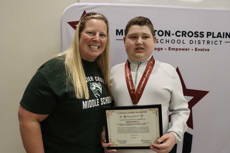 Jennifer Broadley and Nolan Mikla smile and pose for photo