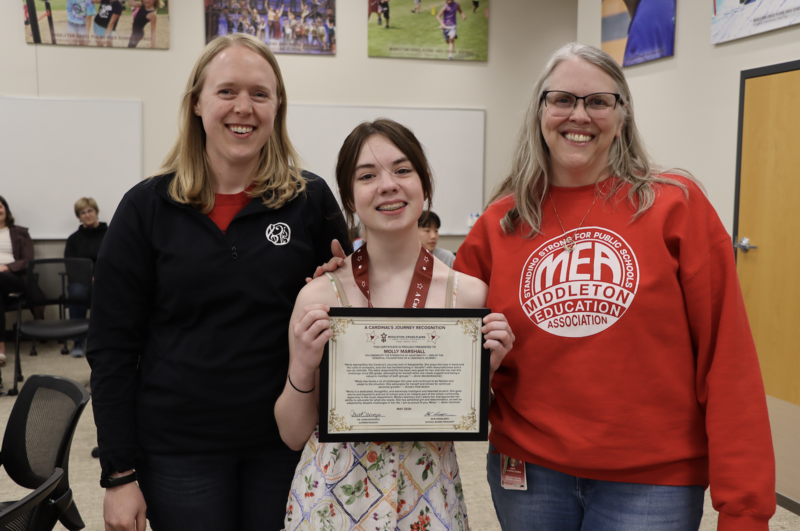 Kristen Flak-Solom, Molly Marshall, and Anne Vanderbloemen smiling and posing for photo