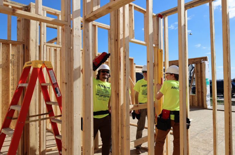 students building a house