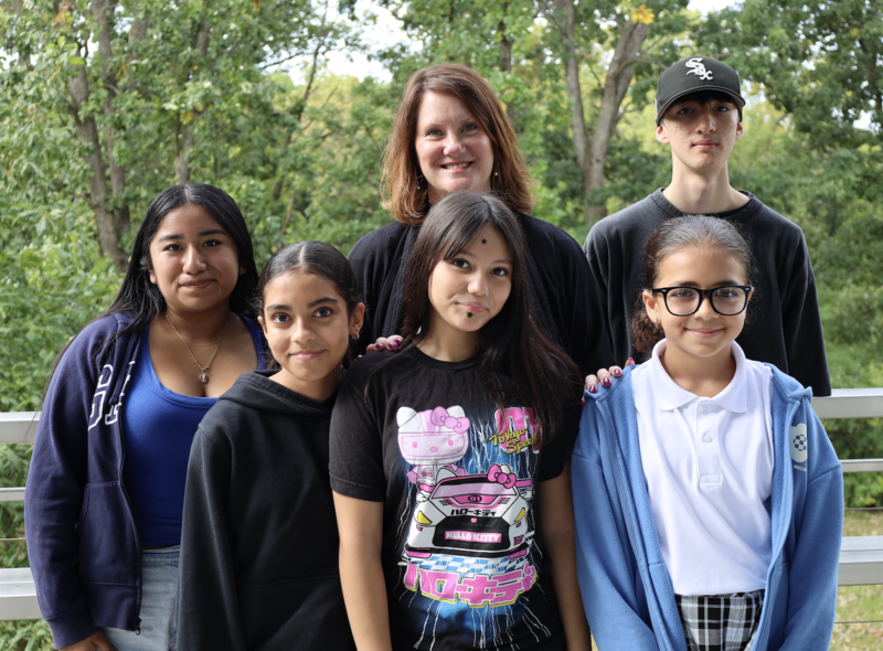 Dr. Monogue with Latino Student Union members at Kromrey Middle School