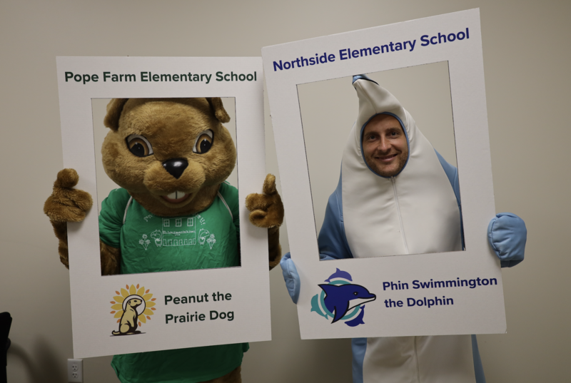 Pope Farm Elementary School mascot, Peanut the Prairie Dog, and Northside Elementary School mascot, Phin Swimmington the Dolphin