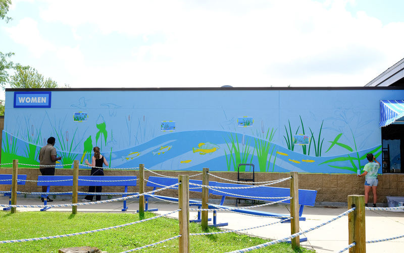 Students working on mural