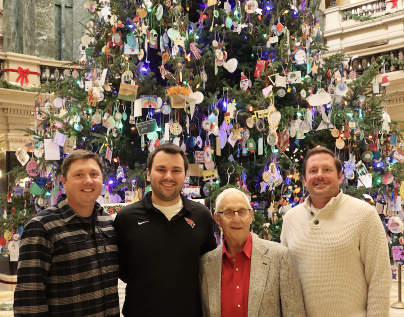 Charlie Wilder, Jarett Peterson, Rodney "Mr. Peanuts Esser, and Brett Humphrey in front of the Capitol Holiday Tree