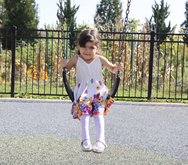 MCPASD 4K student on a swing