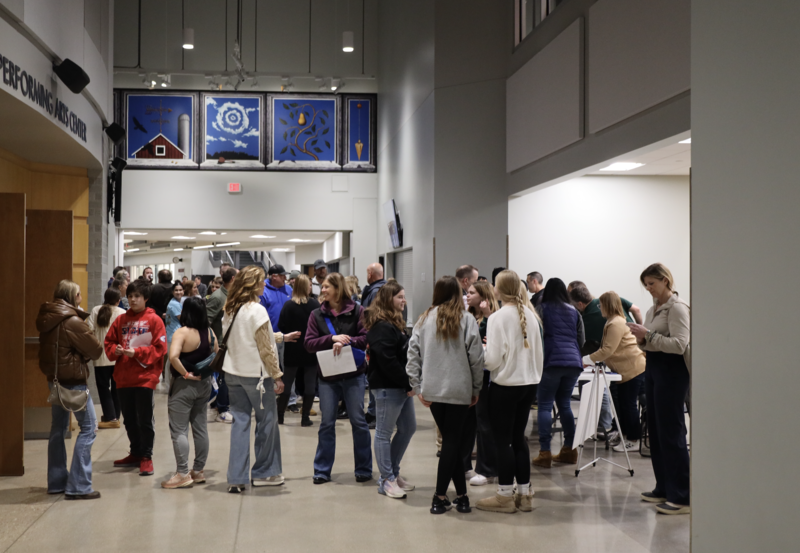 Students and families in the Middleton High School hallway