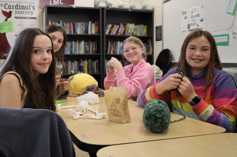 students crocheting