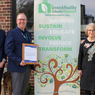 Jerrud Rossing accepting the award on April 11