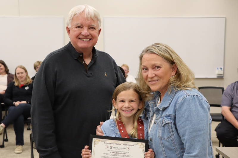 Bob Hesselbein, Charlotte Henry, and Jodi Klare smiling and posing for photo