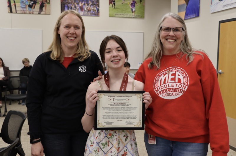 Kristen Flak-Solom, Molly Marshall, and Anne Vanderbloemen smiling and posing for photo