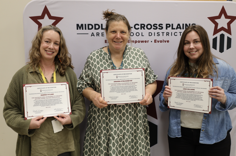 Marnie Hyland, Amanda Struckmeyer, and Leah Williams hold certificates while smiling