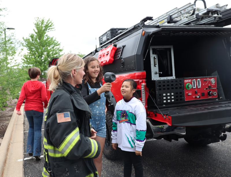 firefighters demonstrating gear 