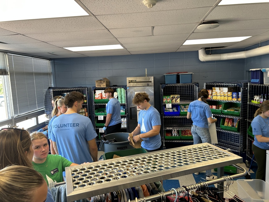 Salve Regina Day of Service Project at  MLK's Island Oasis Food Pantry at MHS