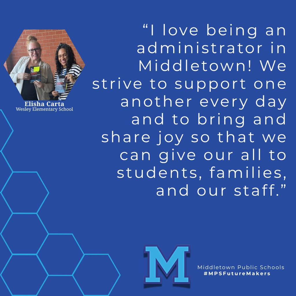 Two women holding books in front of a brick wall and smiling. The image celebrates National Principals Month and includes school branding. and a quote from the principal featured in this photo.