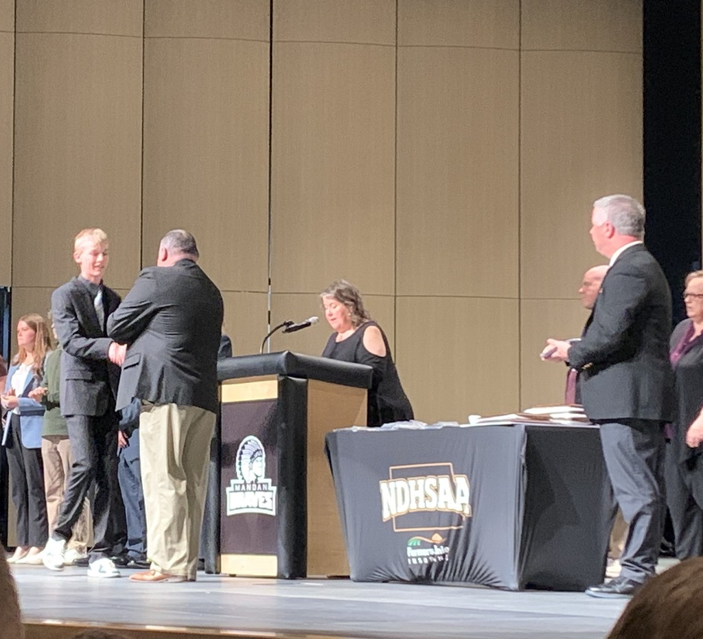 Grandin accepting his Radio award