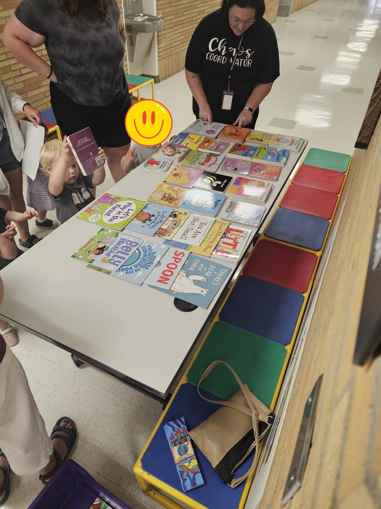 Children getting books.