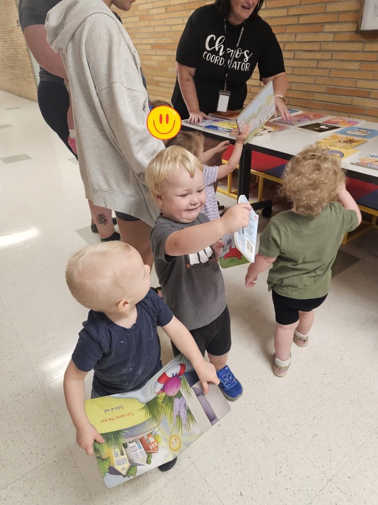 Children getting books.