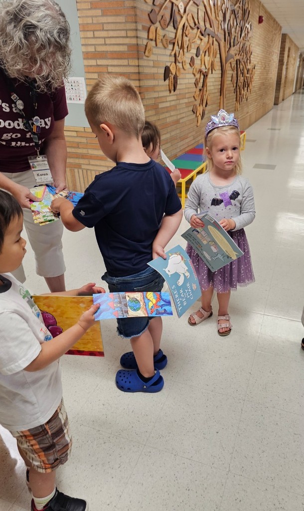 Children getting books.