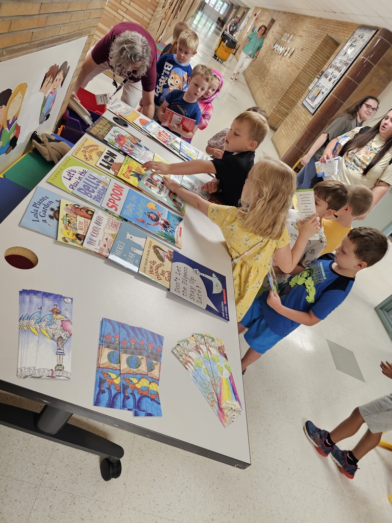 Children getting books.