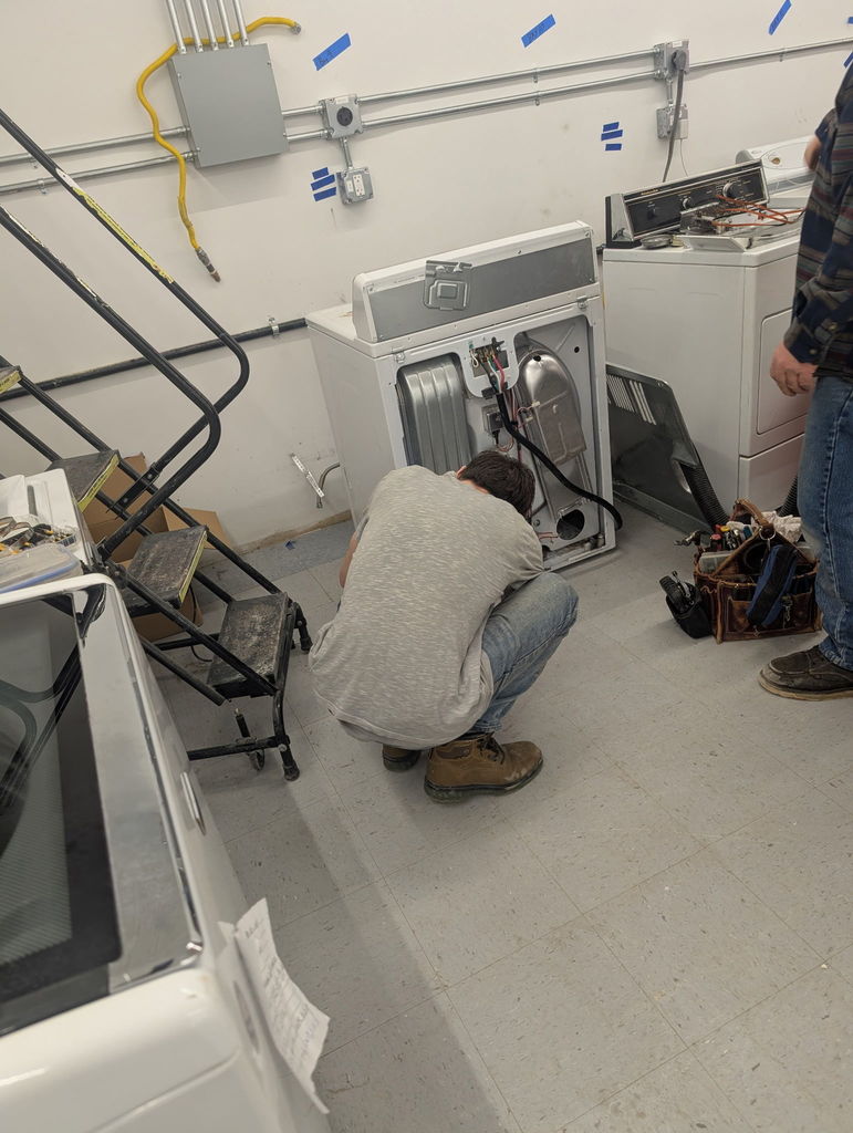 MCESA Student working at Pivot Point on dryer