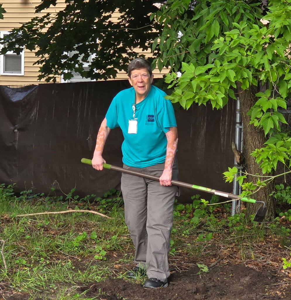 Yvonne Custodial Team Member Cleaning Storm Water Drain