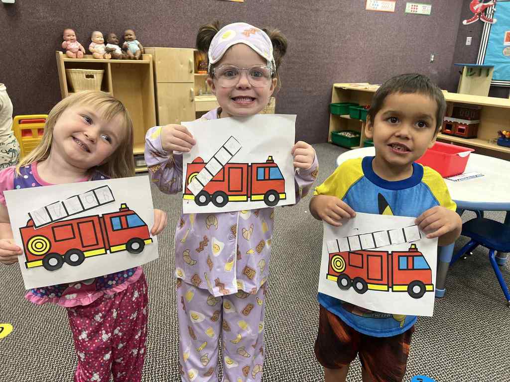 the kids assembling fire trucks