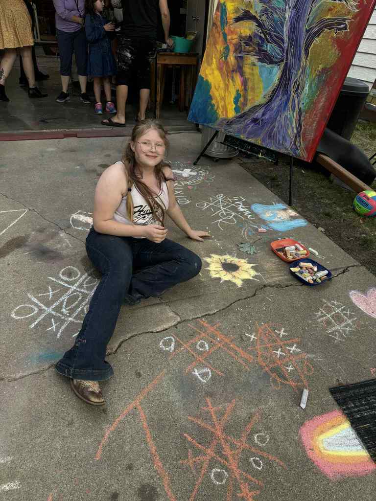 a girl creating a sunflower