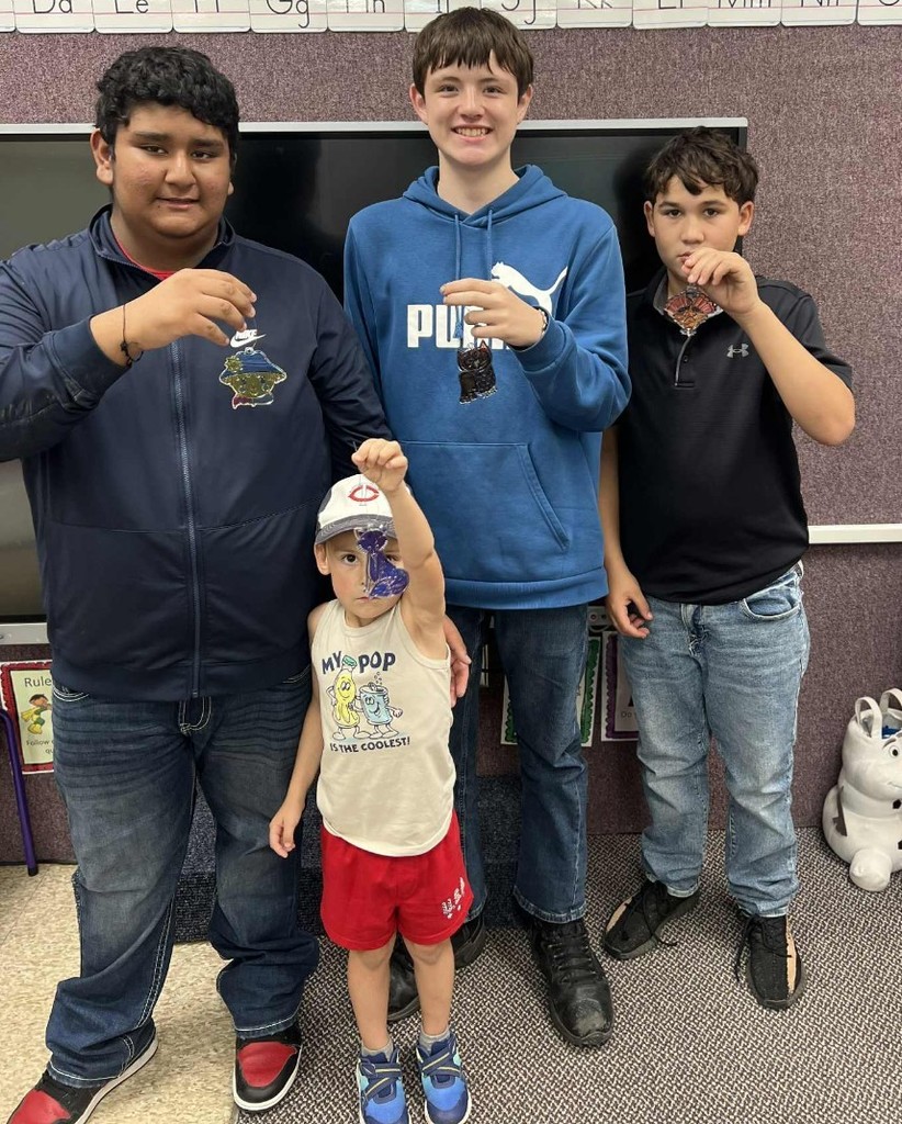 3 boys and their dream catchers.
