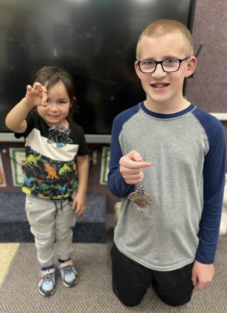 2 boys and their dream catchers.