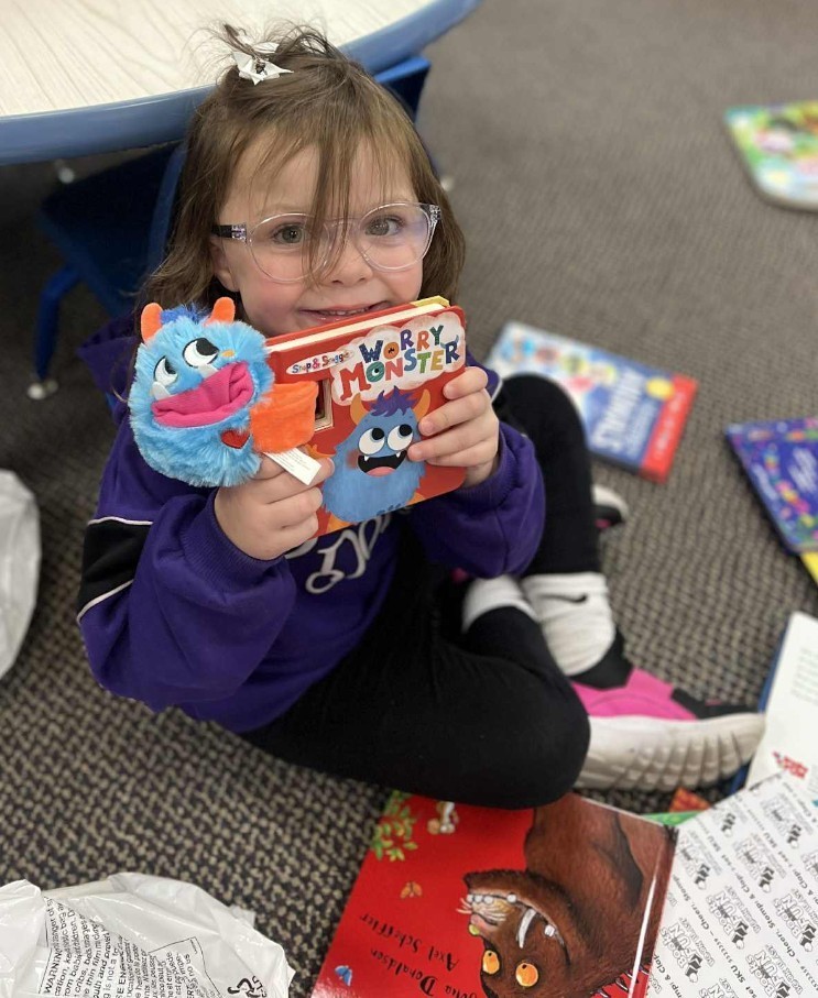 a girl and her book