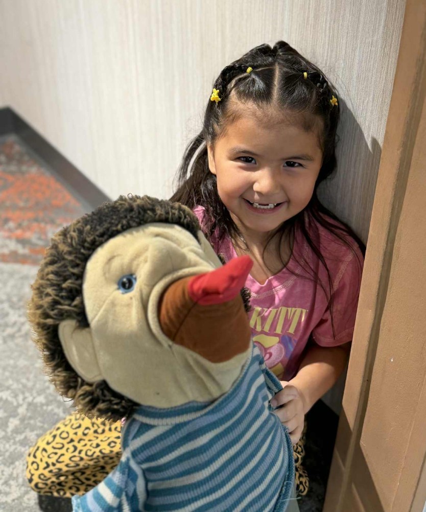 playing with puppets