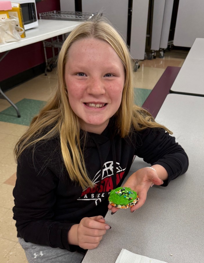 a girl and her cookie