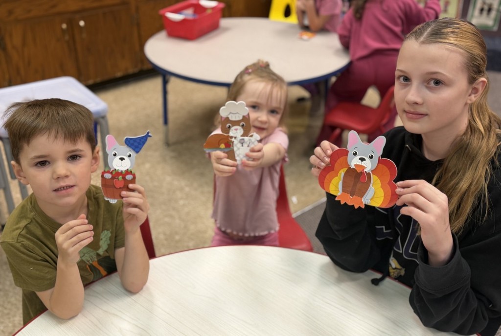 3 kids creating animals