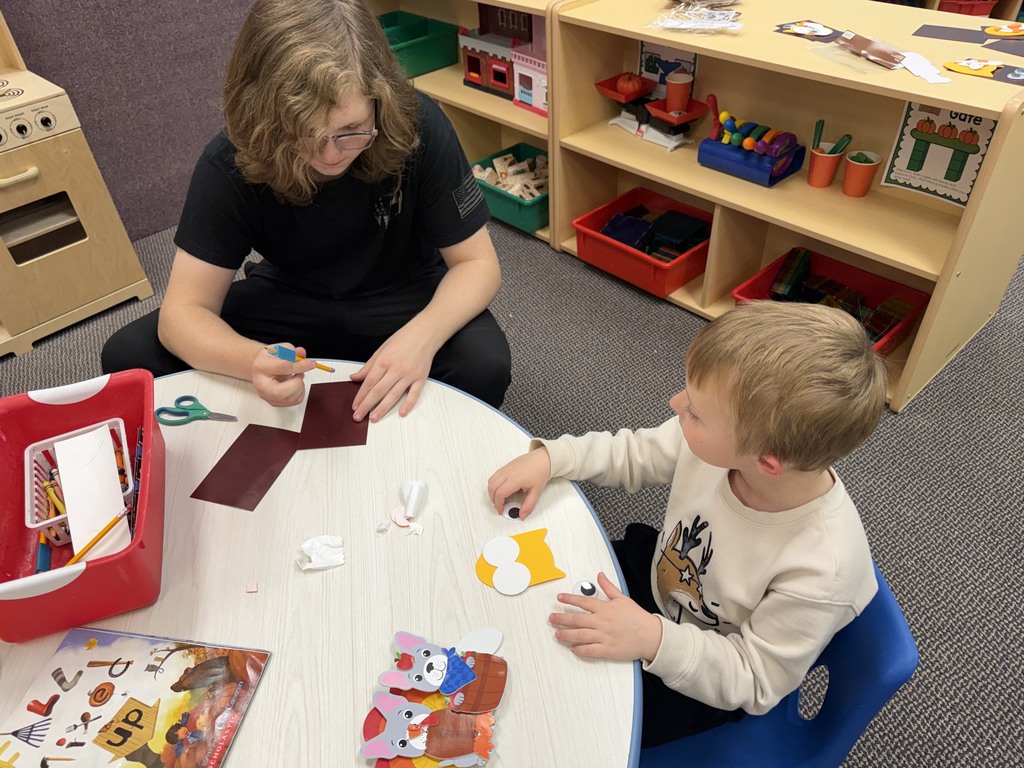 2 boys making crafts
