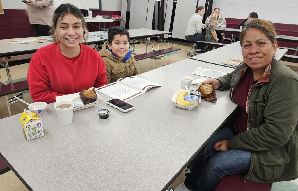 a family eating and reading