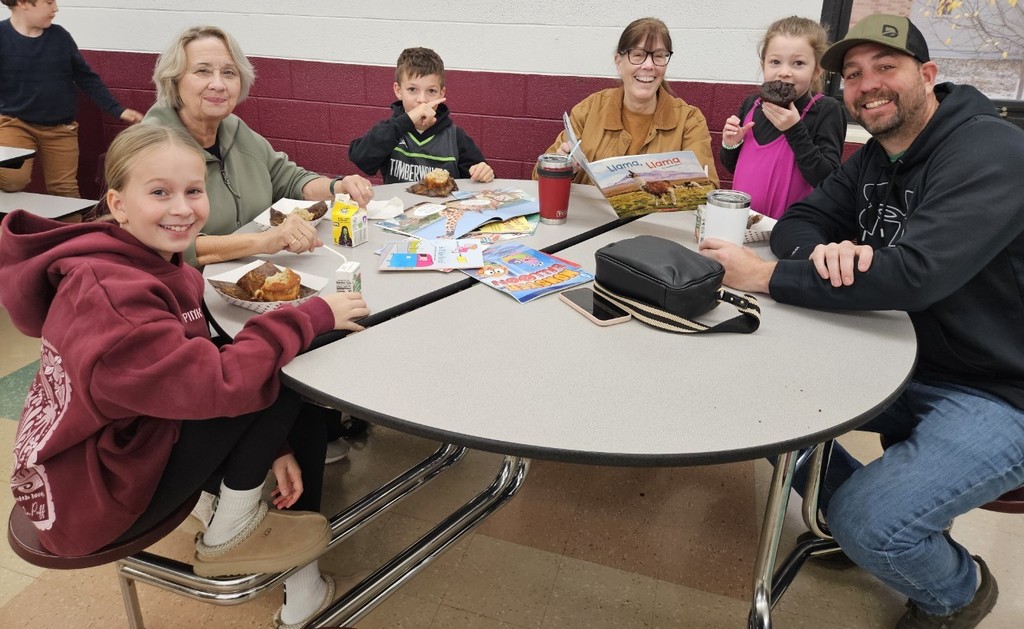 a family eating and reading