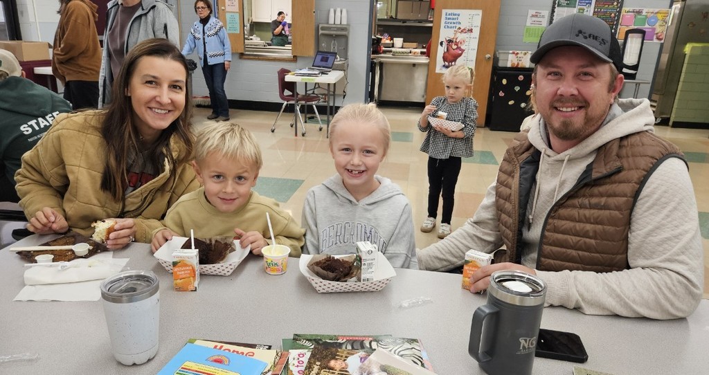 a family eating and reading