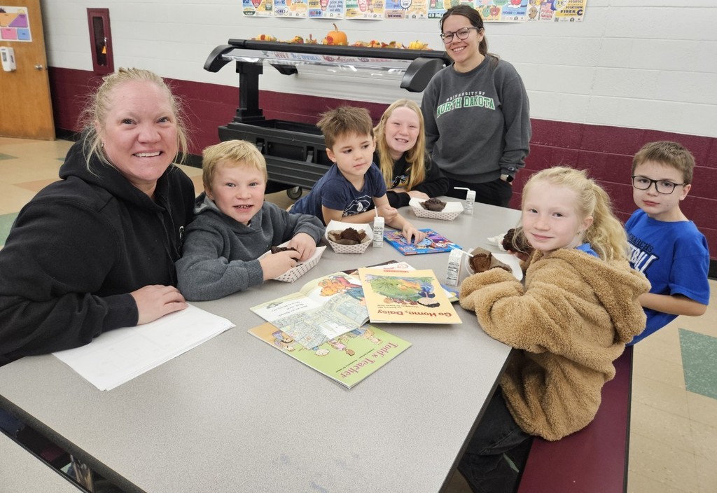 moms, aunts and cousins reading together