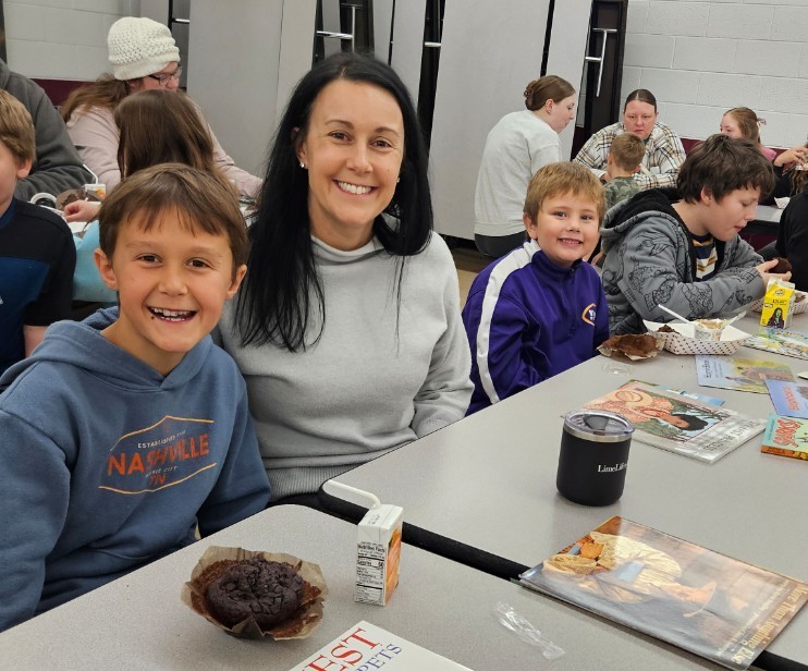 a mom and her boy reading