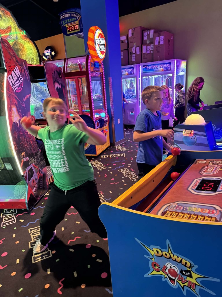 2 boys throwing balls