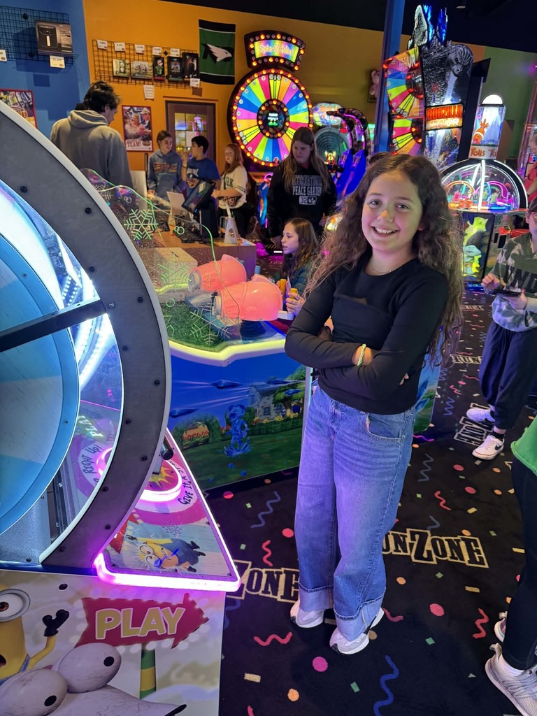 a girl at the arcade