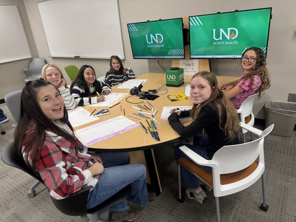 the girls learning at UND