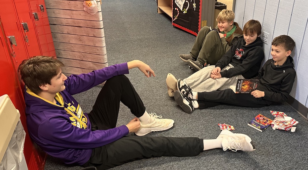 boys looking at books