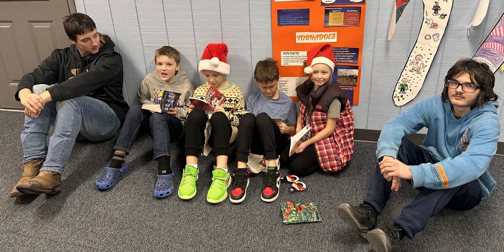 kids looking at books