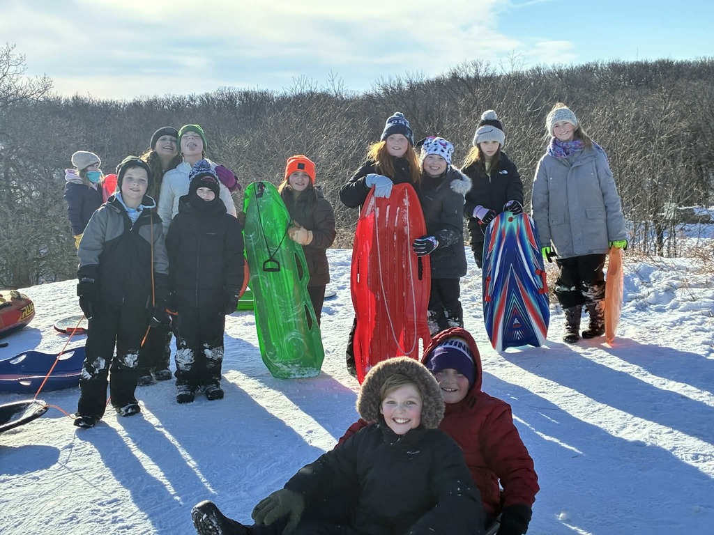 kids waiting to go down the hill.