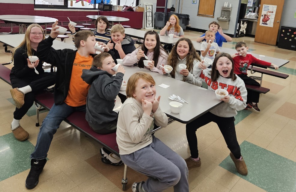 raffle ticket winners eating ice cream.