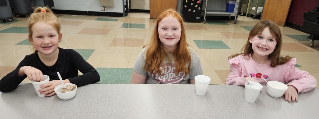 3 girls enjoying tasty treats