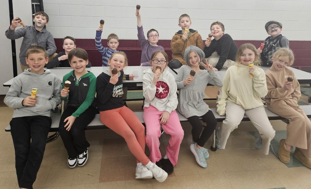 big smiles and ice cream for the raffle ticket winners.