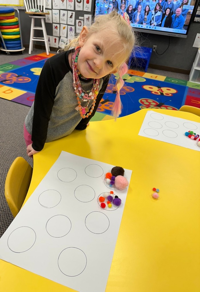 a girl and her pompons
