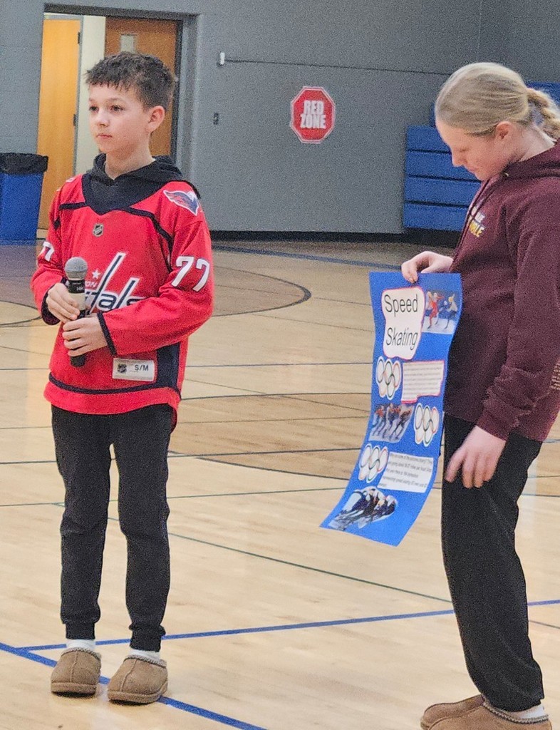 2 kids telling us about speed skating.